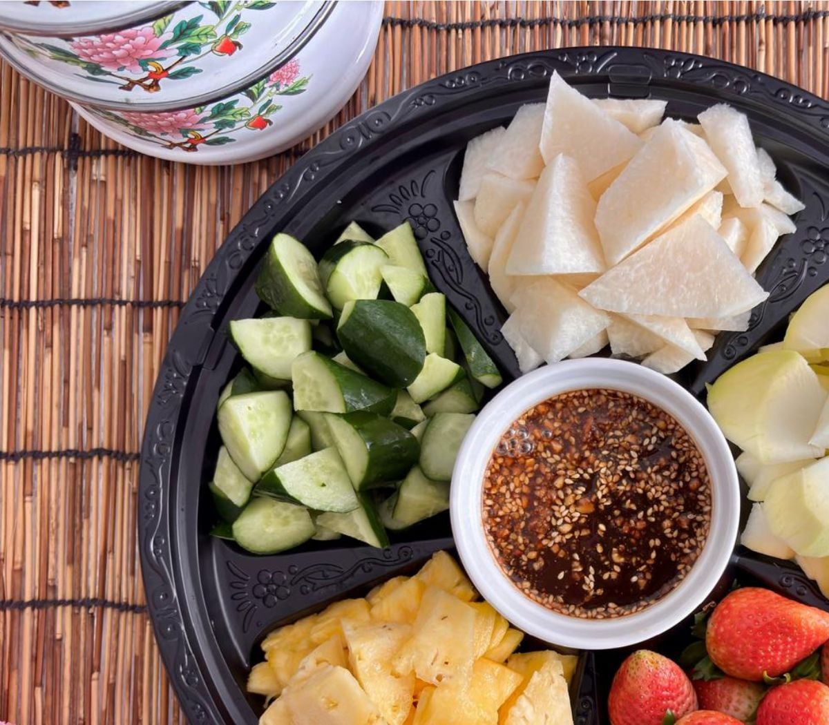 LIVE STN- Hawker Style Fruit Rojak Pineapple, Cucumber, Turnip, Mango, Yu Tiow, Tau Pok, Shrimp Paste Sauce & Crushed Peanut (20% of the sauce can be vegetarian)